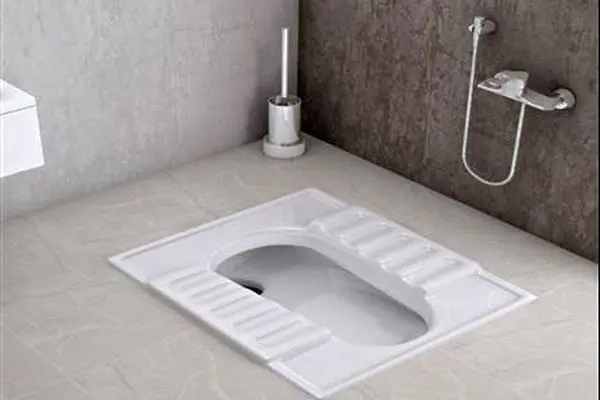 عکس/ خلاقیت خنده دار پدر ایرانی در تعمیر سیفون توالت حماسه ساز شد!